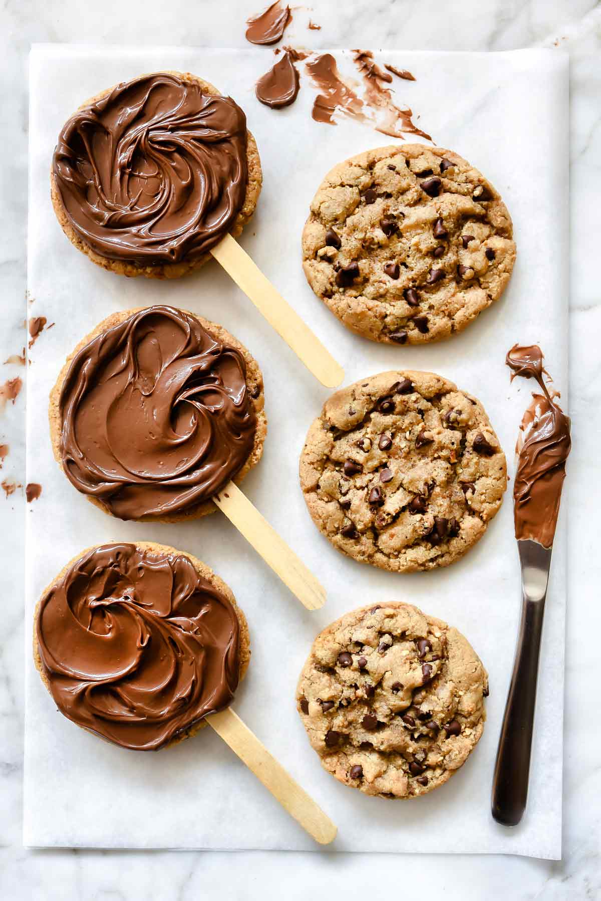Chocolate Chip Sandwich Cookie Pops with Nutella® | foodiecrush.com